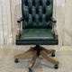 English chesterfield office armchair in green leather from the 1980s
