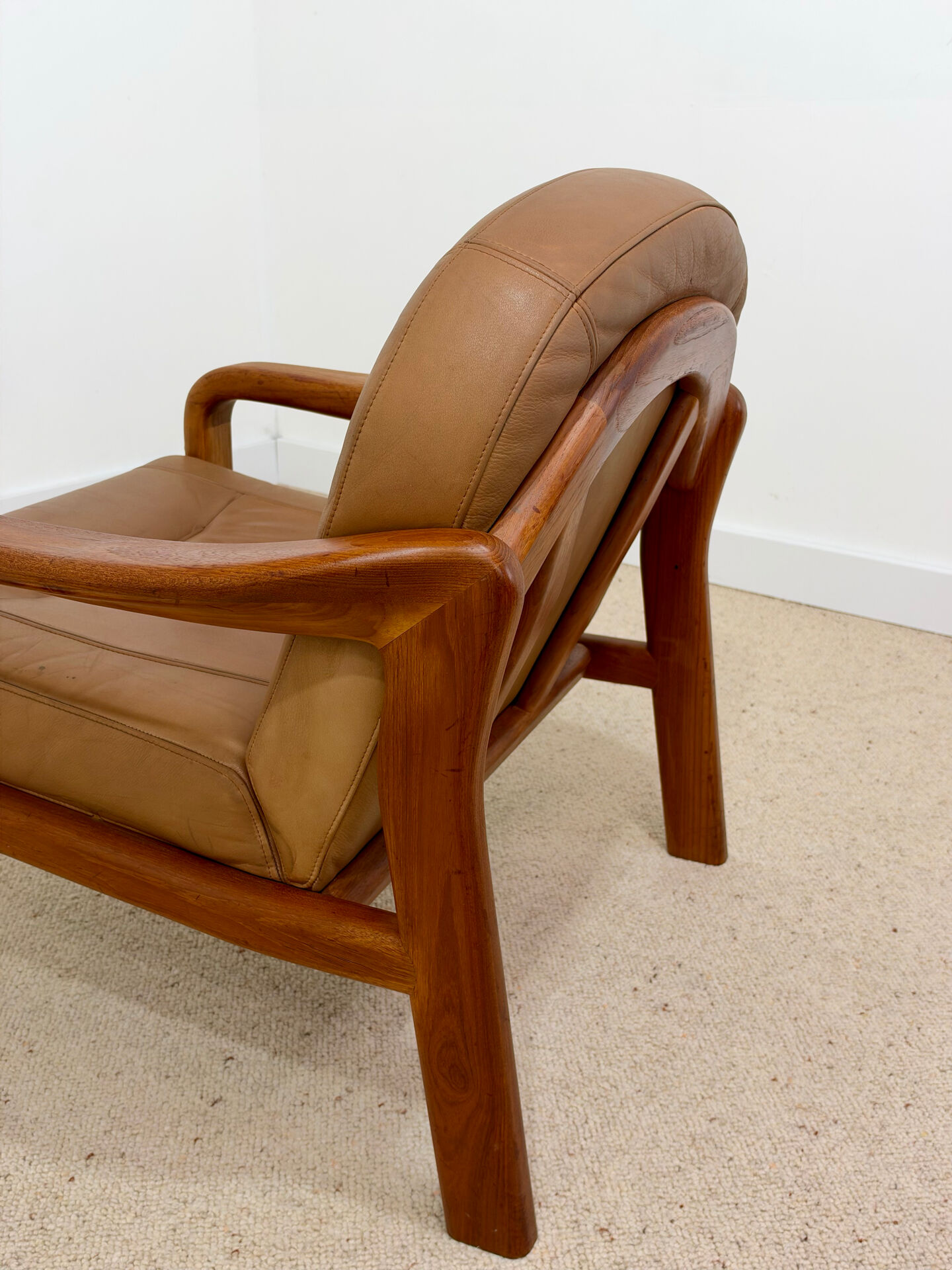 Vintage leather and wood armchair – 1970s