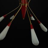 Mid-Century 12 lights chandelier in the manner of Stilnovo. Italy 1950s