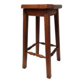 Tabouret en bois massif vintage