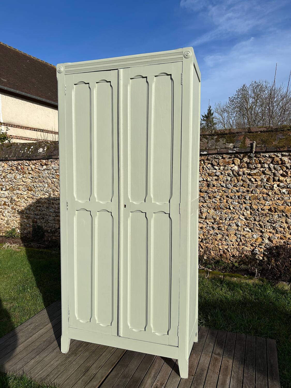 Restored vintage Parisian wardrobe from the 1930s in light green.