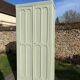 Restored vintage Parisian wardrobe from the 1930s in light green.
