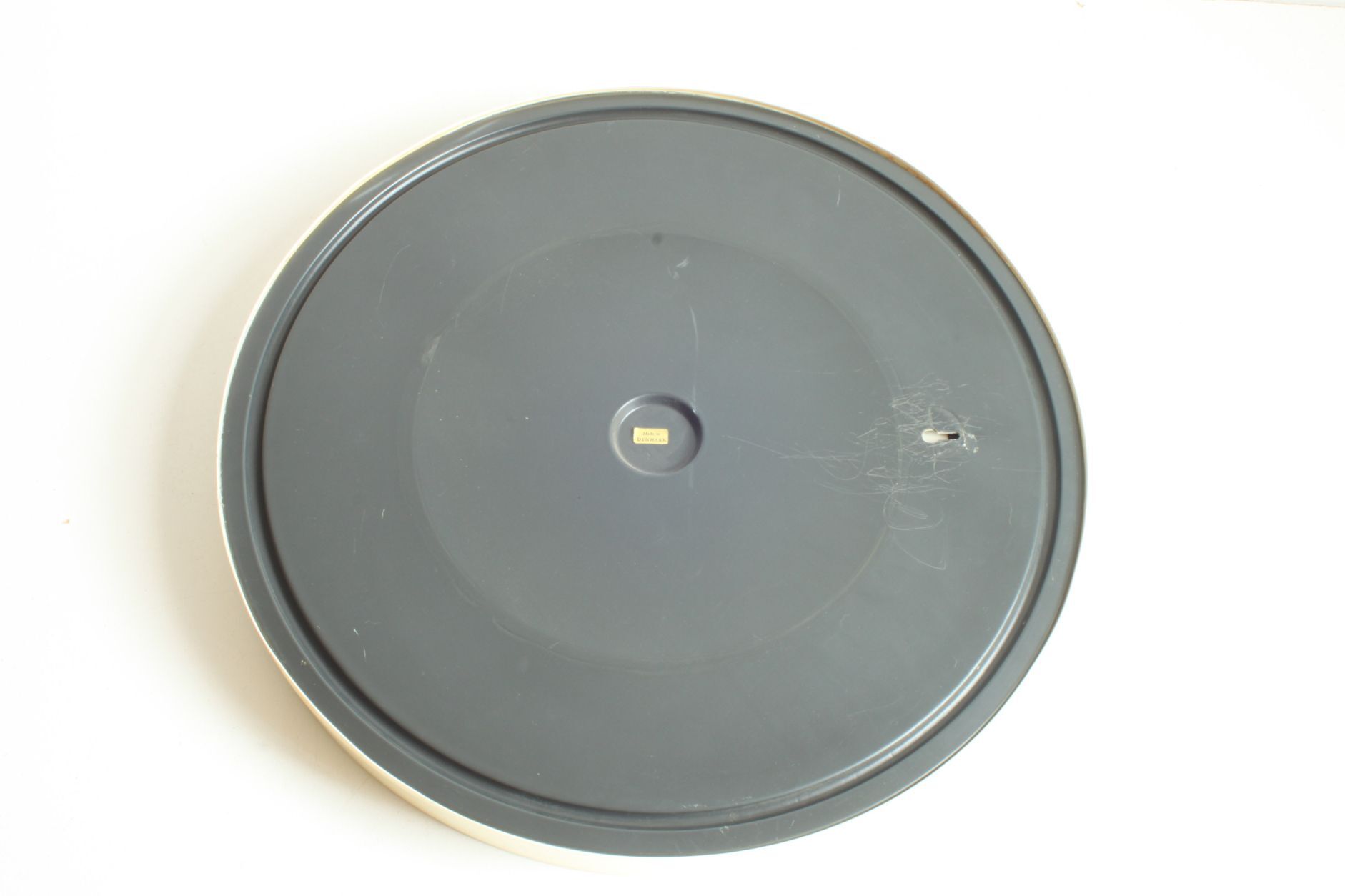 Round conical mirror in white plastic, Denmark 1960s.