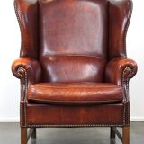 Large comfortable sheepleather wingchair in good condition and beautiful colours