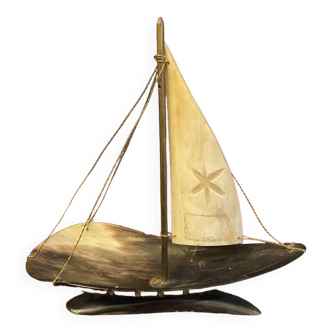Small sailing boat model in hand carved cattle horn 1970s