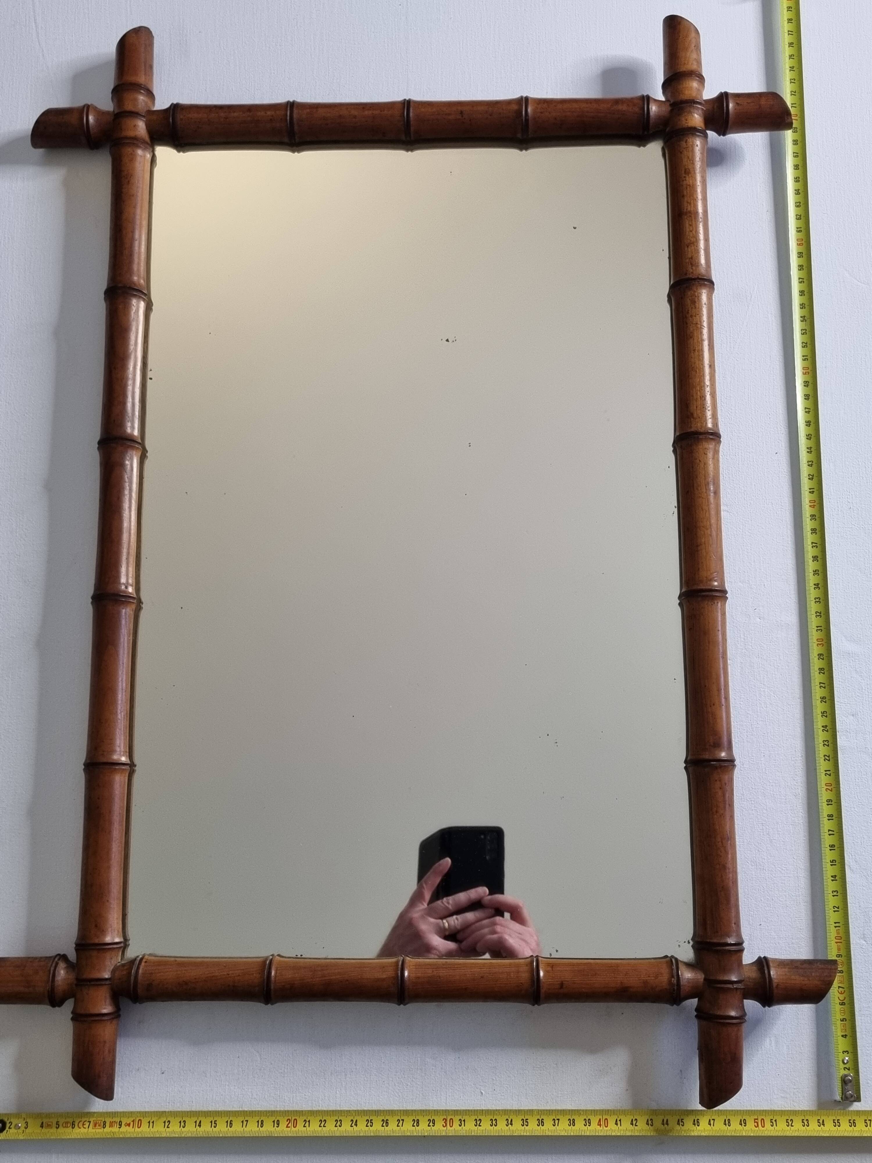 Large turned wooden bamboo mirror, 55 x 78 cm, circa 1900