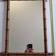 Large turned wooden bamboo mirror, 55 x 78 cm, circa 1900