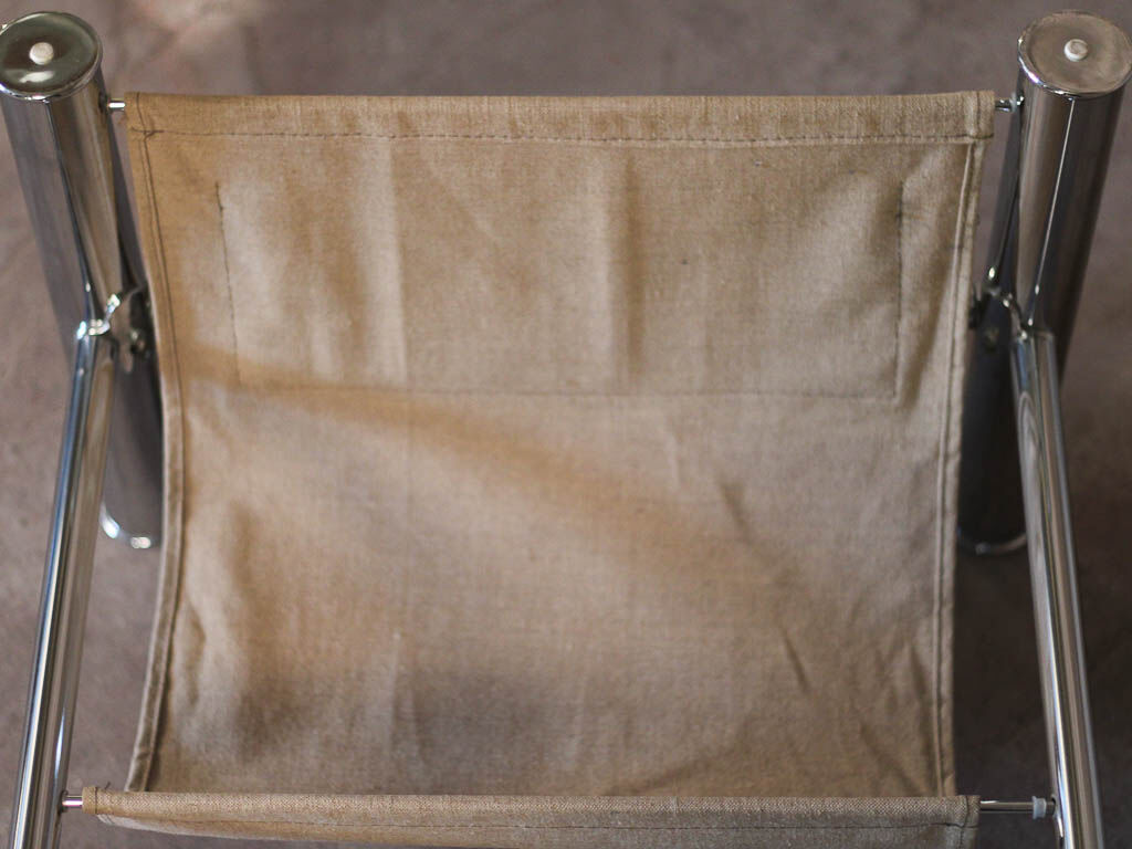 Glass rectangle coffee table with magazine rack, circa 1970