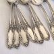 Set of 11 small vintage silver-plated metal spoons