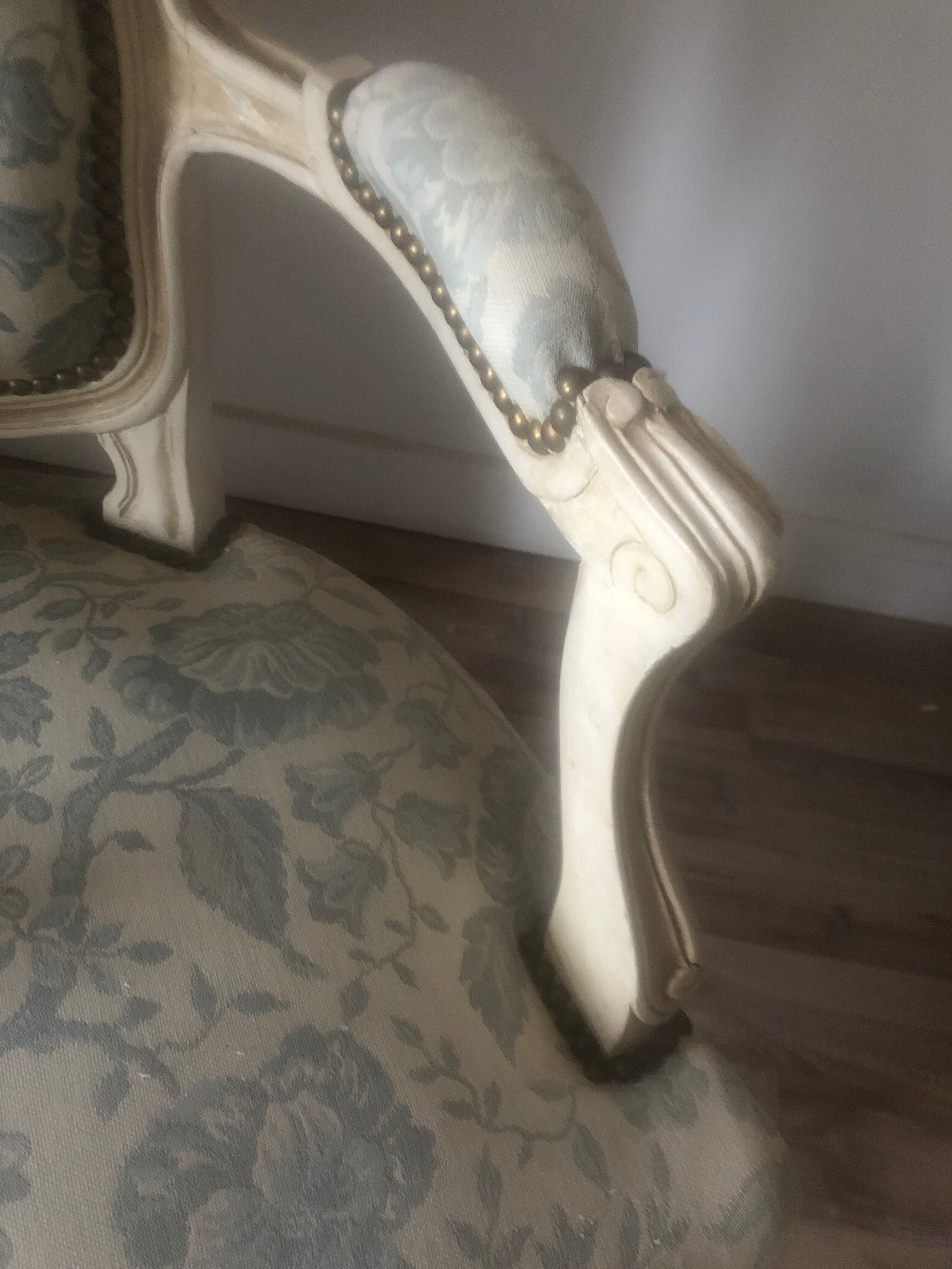 Armchair and its footrest Louis XV style