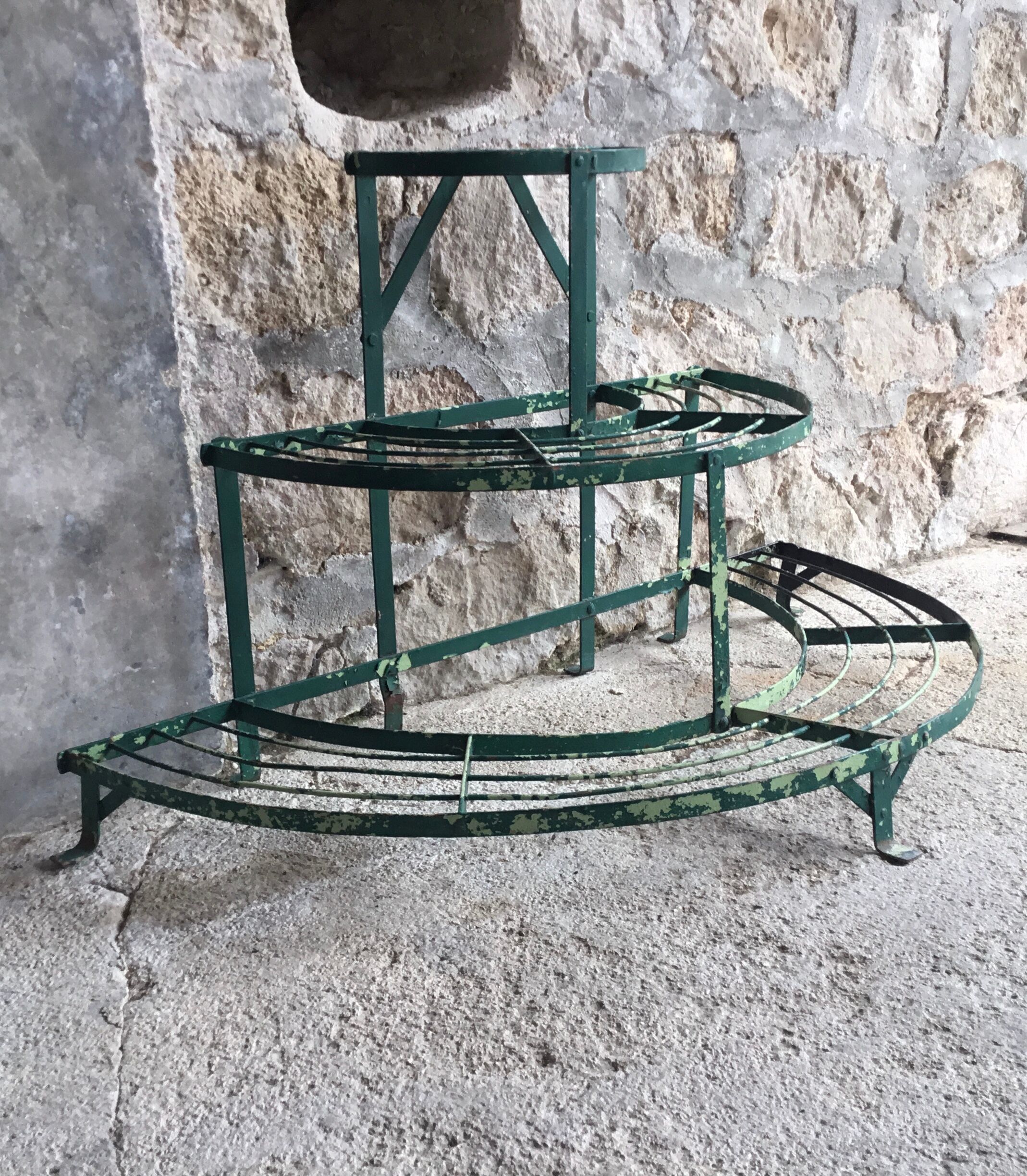 Antique half-moon metal plant stand
