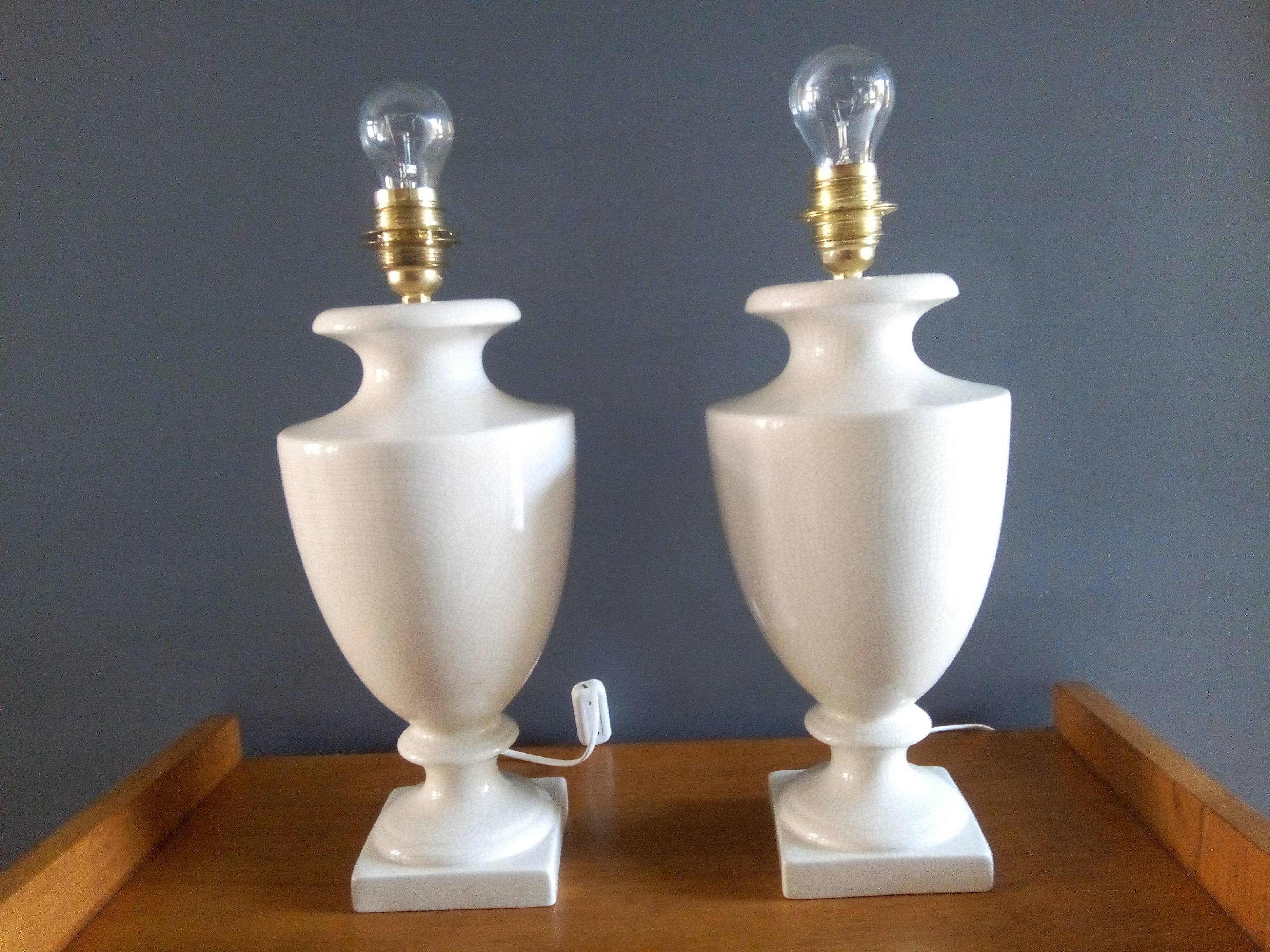 Pair of legs of cracked earthenware lamps