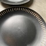 7 black ceramic plates