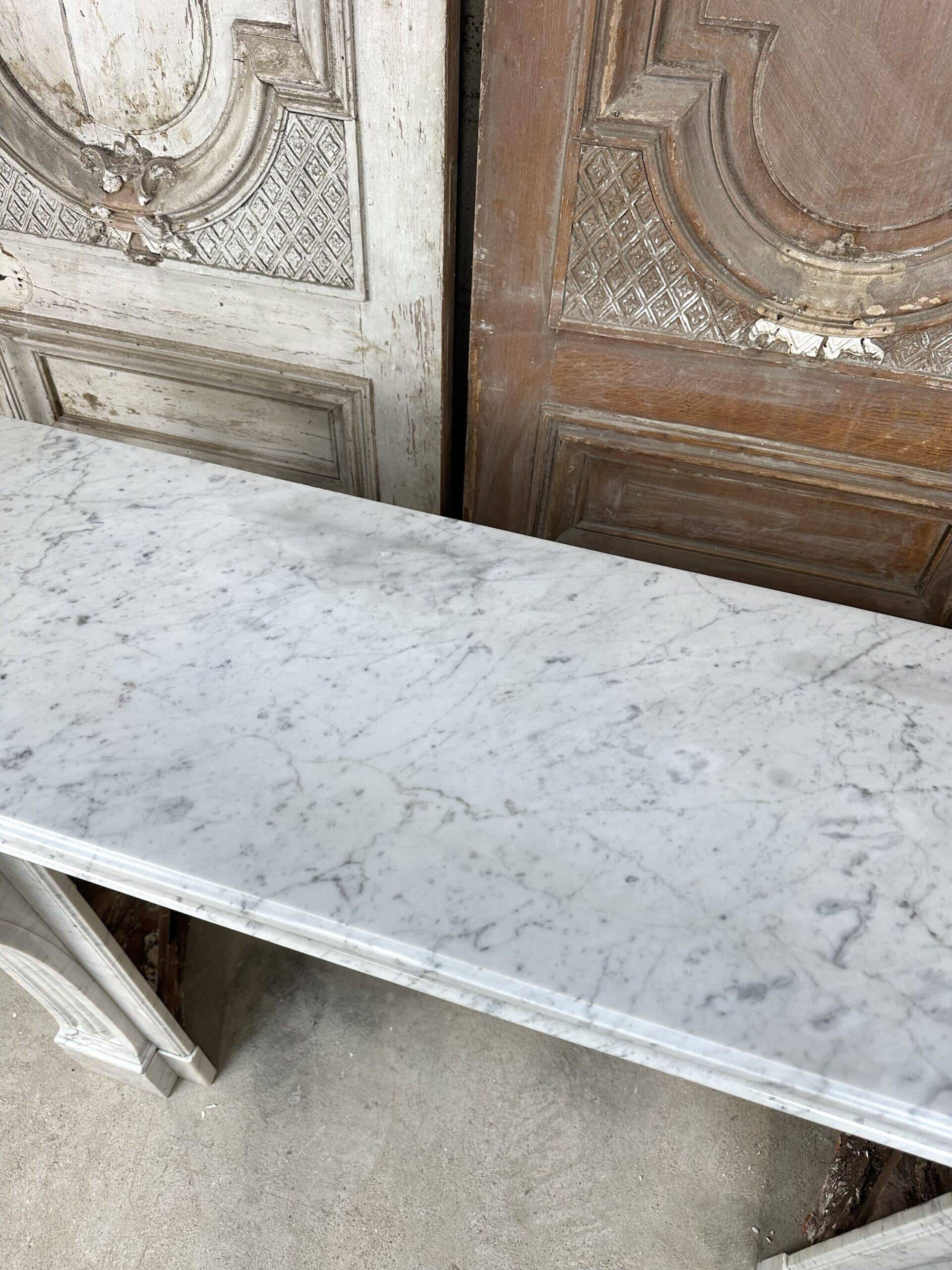 Cheminée en marbre blanc de carrare style Louis XVI vers 1890