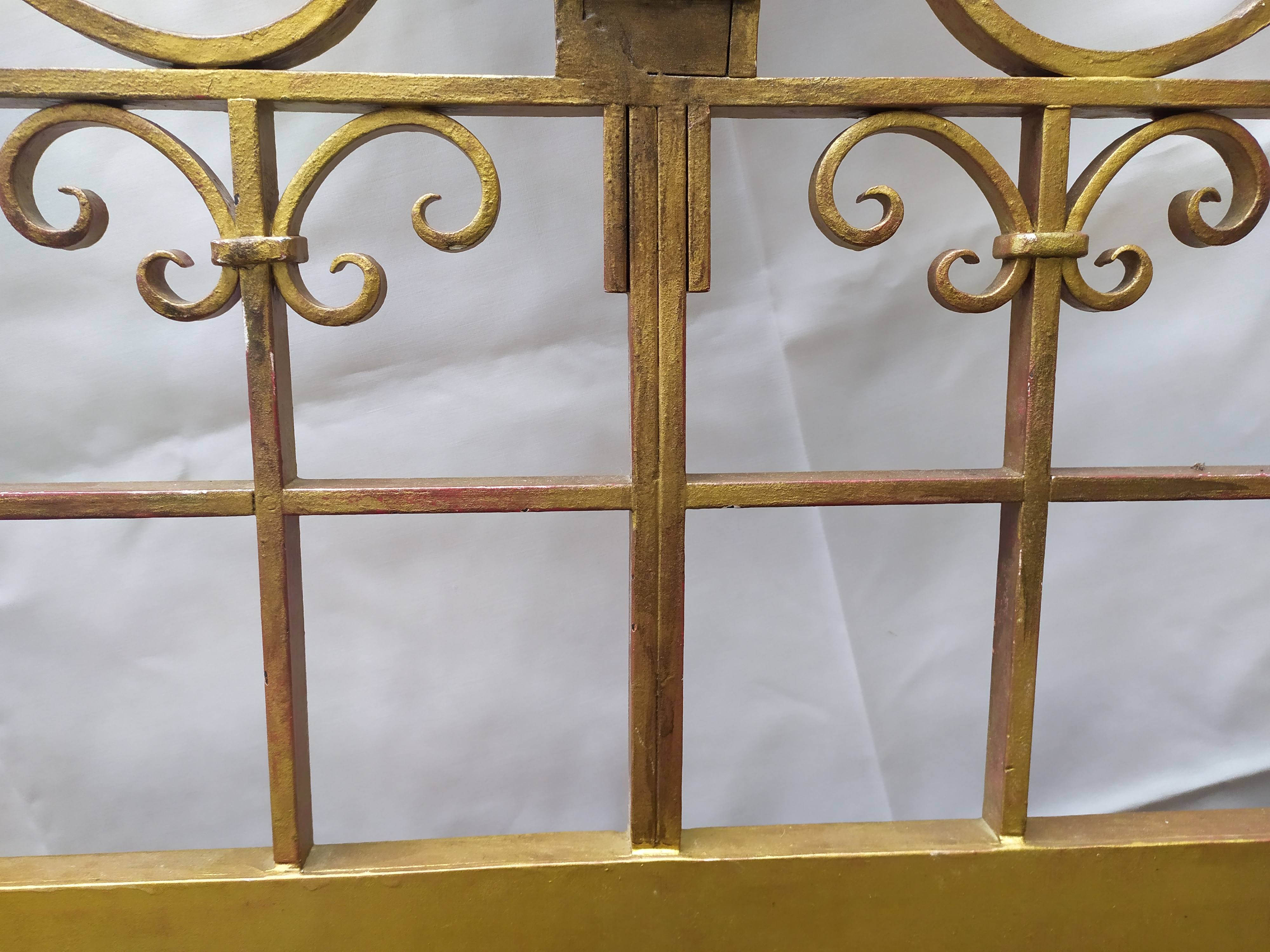 Golden wrought iron bedhead