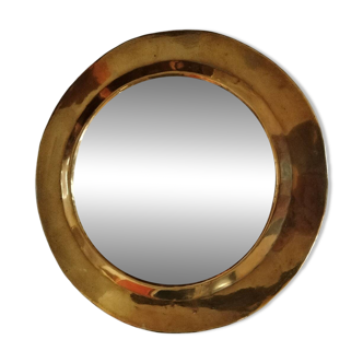 Pretty round mirror in brass and quilted glass