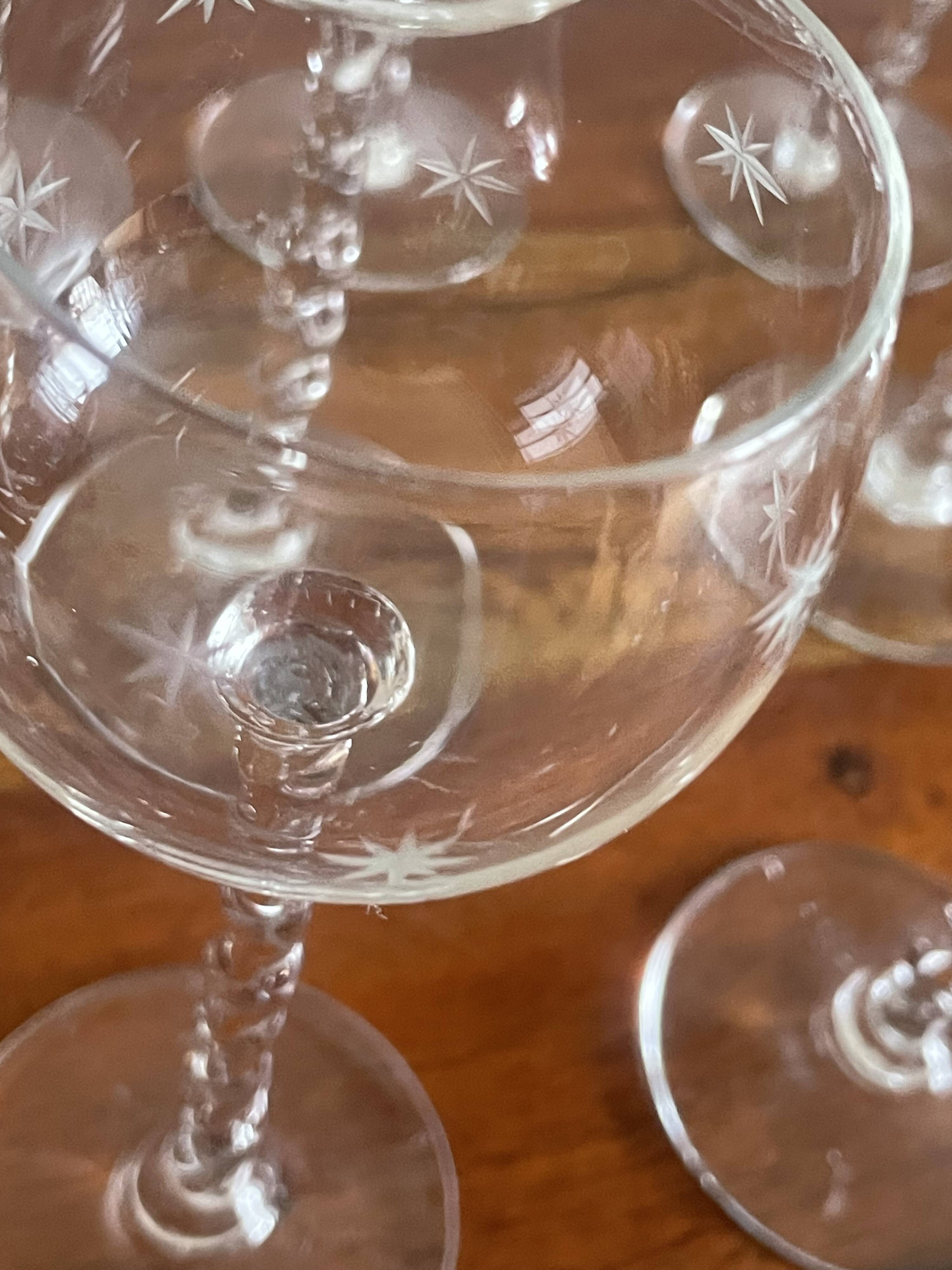 8 glasses with twisted stem and star pattern