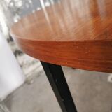 Round coffee table in walnut veneer and metal