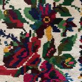 White vintage floral rug made by hand in Romania, beautiful flowers