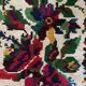 White vintage floral rug made by hand in Romania, beautiful flowers