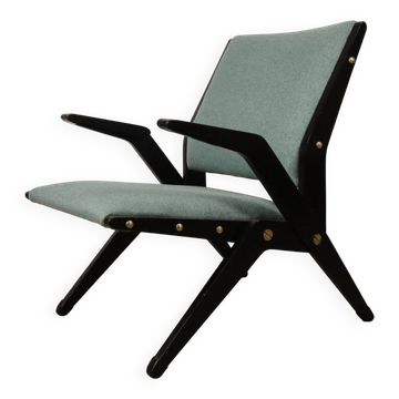Vintage armchair from the 60s in black wood and fabric.