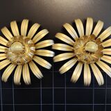 Golden metal flower sconces