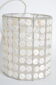 Suspension in mother-of-pearl buttons