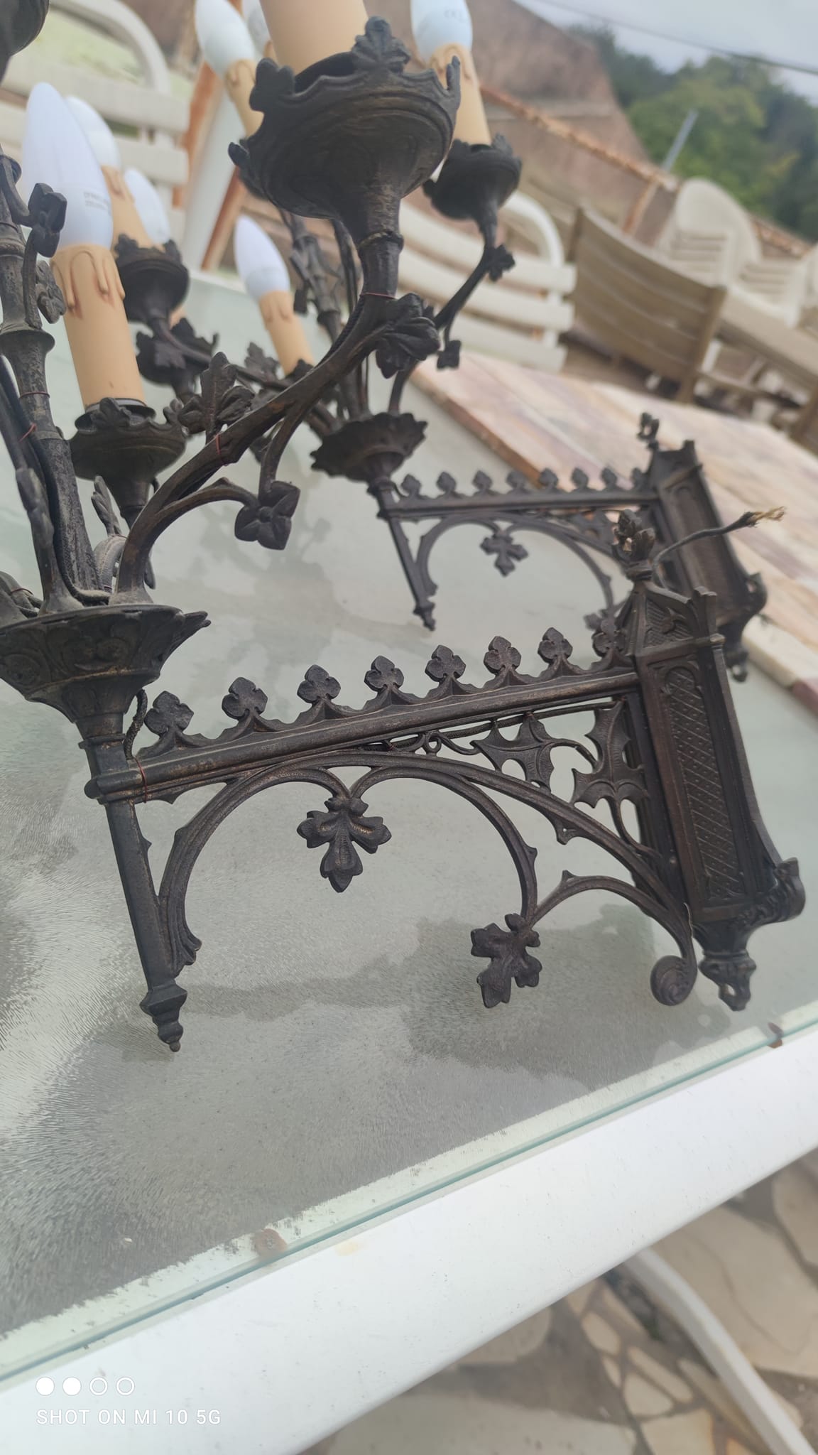 Pair of 19th-century bronze cathedral wall sconces with 5 lights