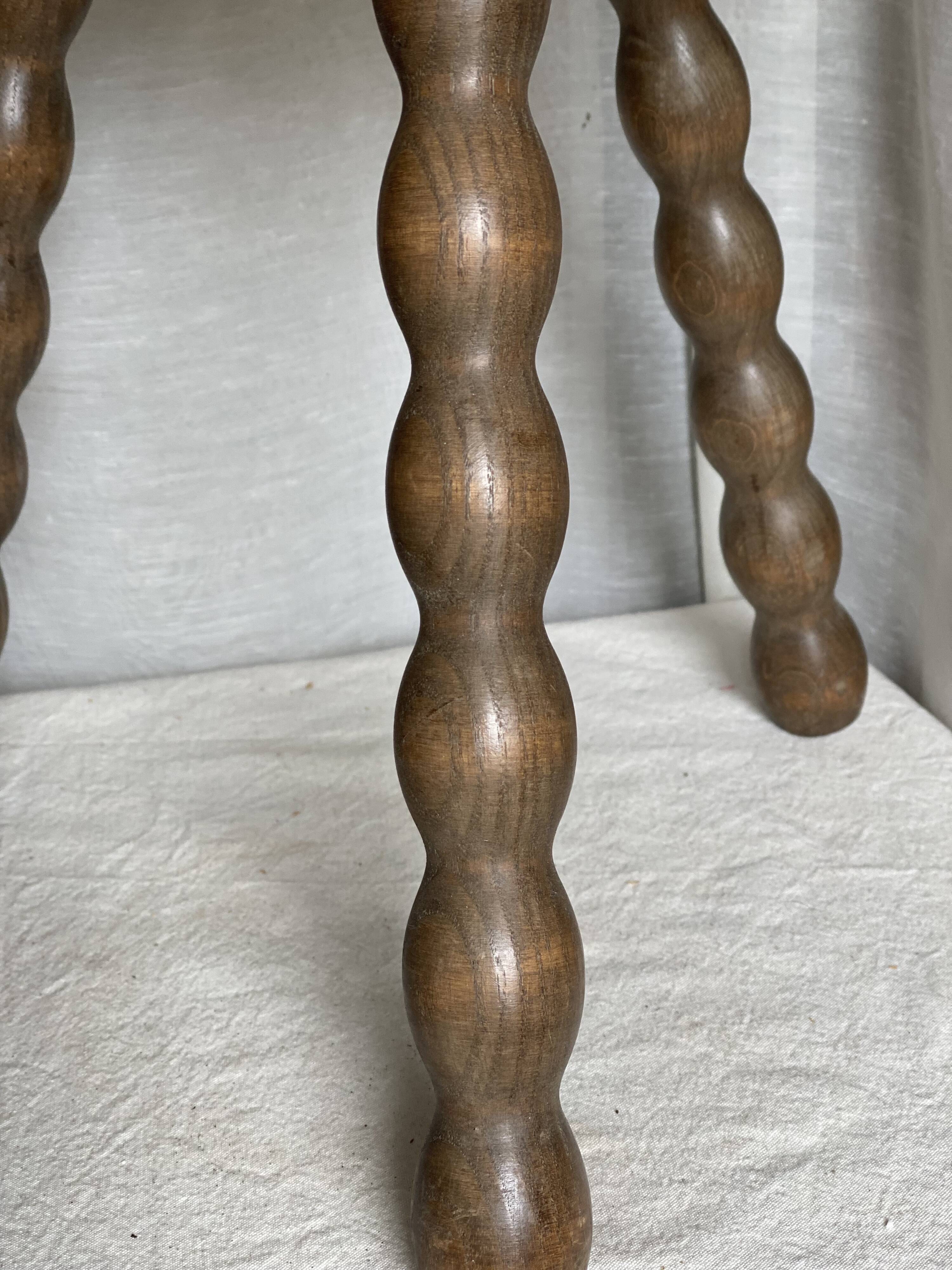 Vintage 1950s half-moon tripod stool