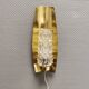 Older wall lamp in brass with hard pressed glass shade.