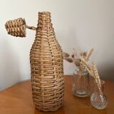 Bouteille en verre et rotin vintage