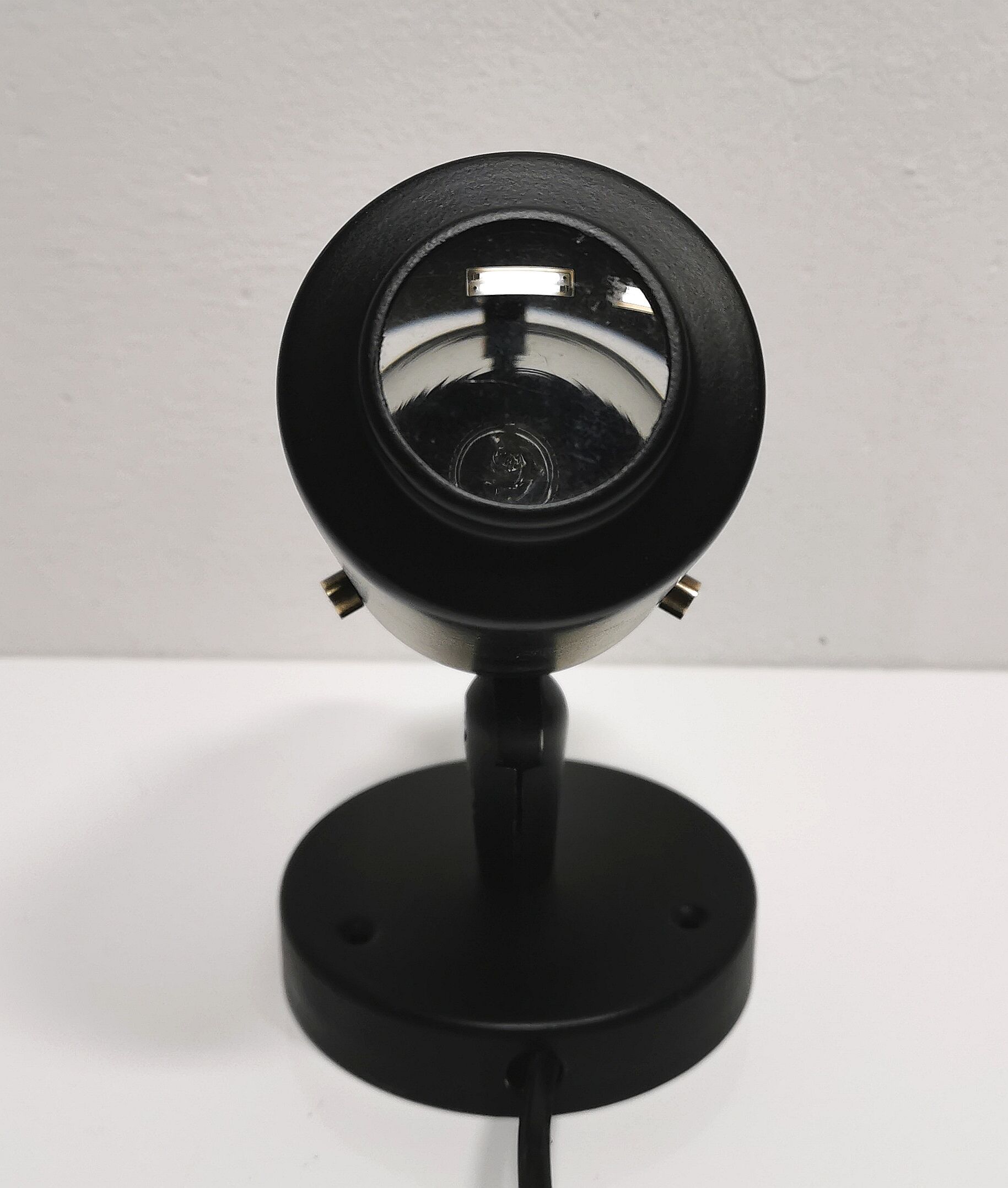 Jacques Biny's black zodiac sconce for Lita