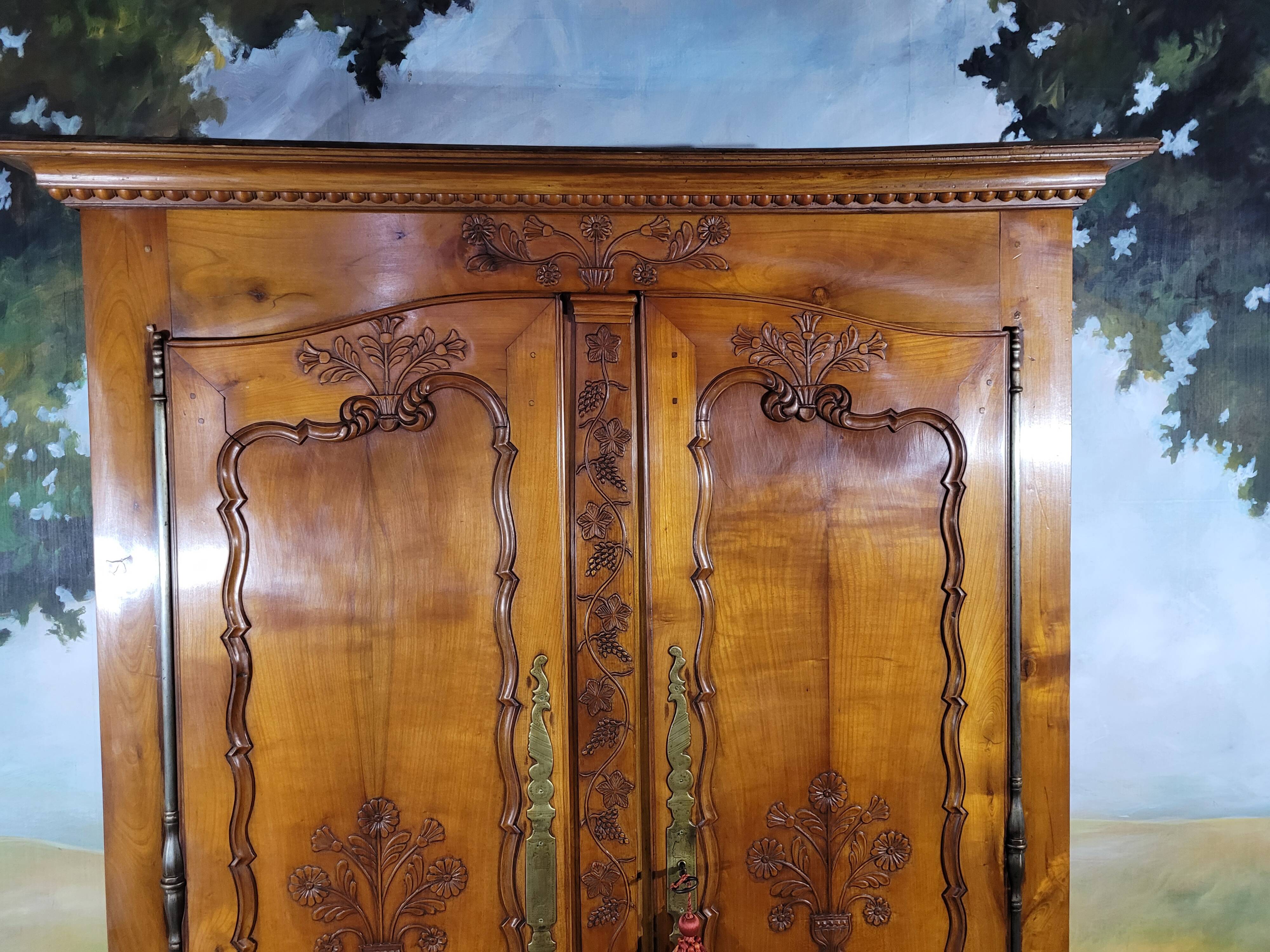 Louis XV style carved cherry wood armoire