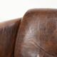 Cowhide armchair in Aviator design in a warm brown colour