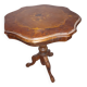 Gueridon in cherry wood with patterned veneer on the top.