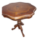 Gueridon in cherry wood with patterned veneer on the top.