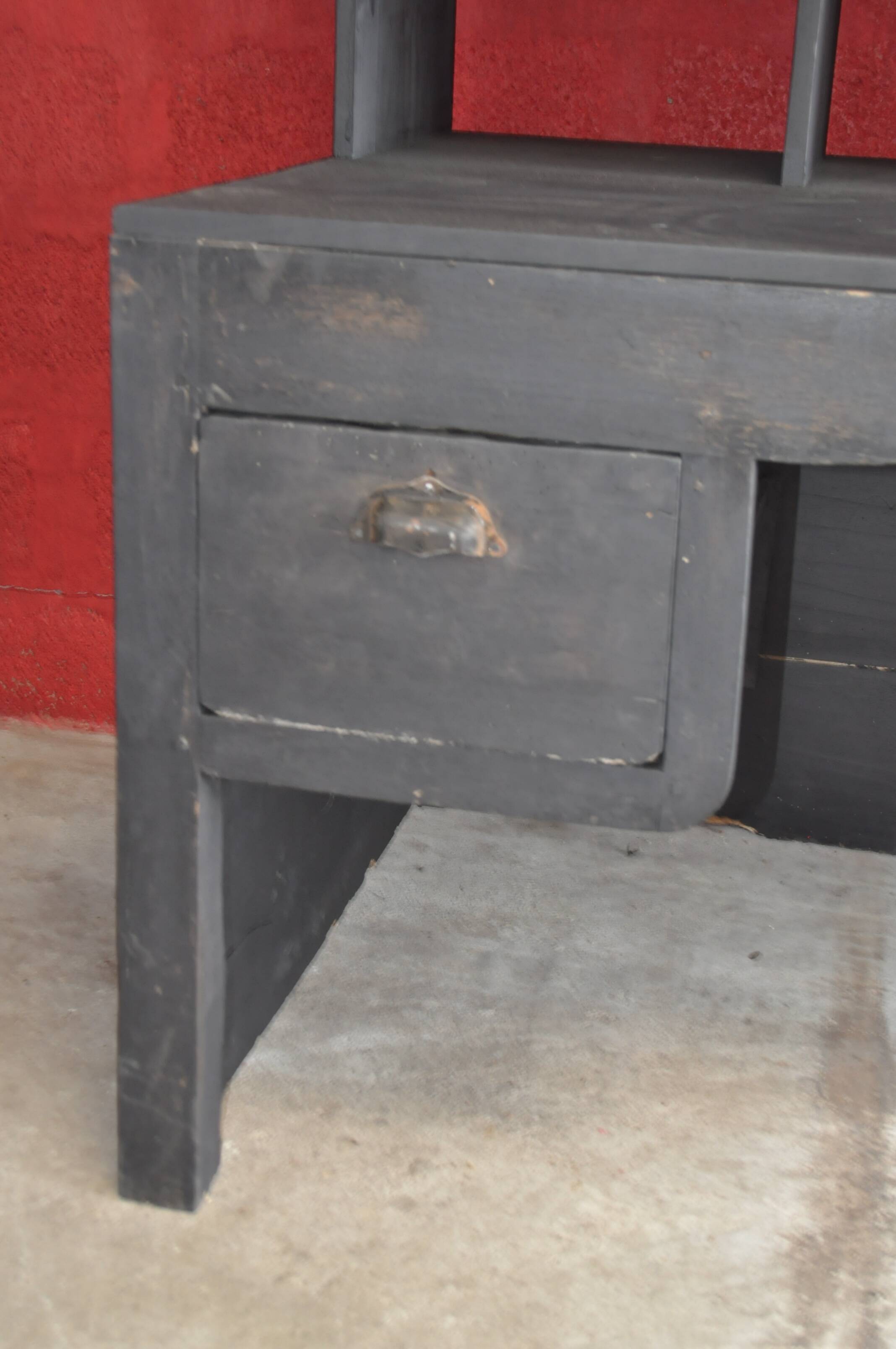 Wooden postal sorting desk.