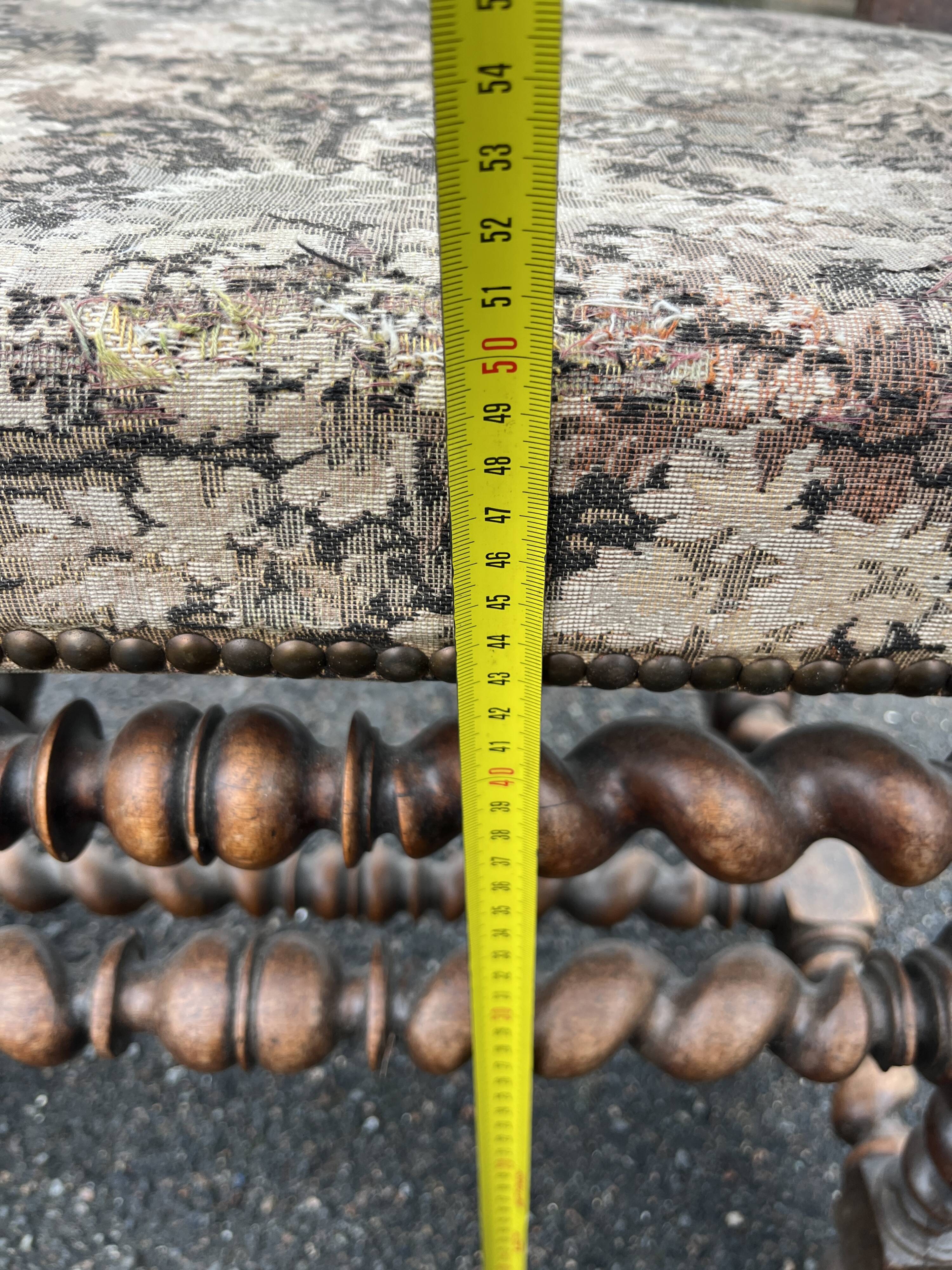 Louis XIII style armchair with twisted backrest and legs.