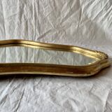 Ancien miroir mural biseauté en bois massif doré