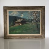 Old cottage and flowering tree table