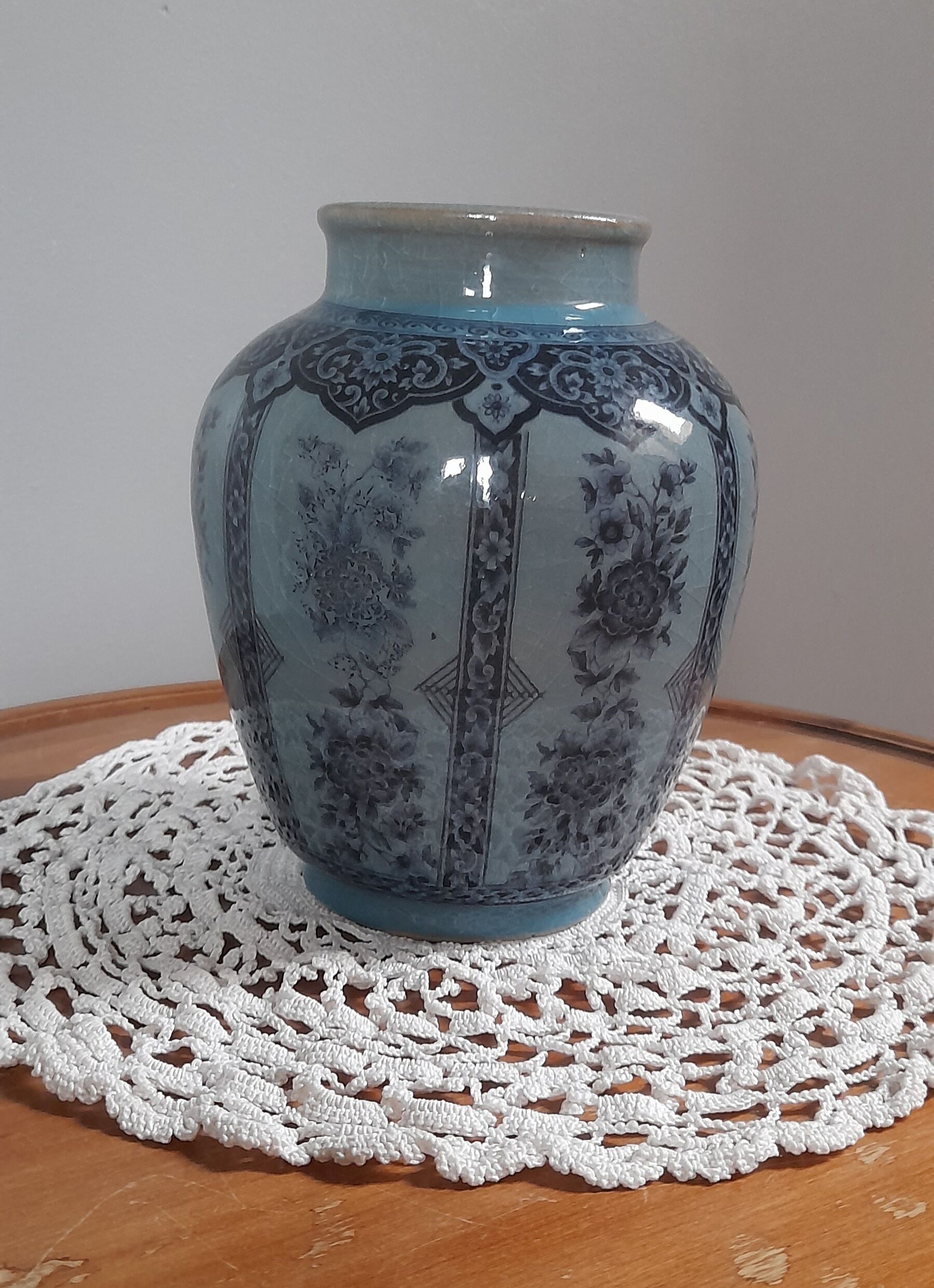 Decorative vase in blue glazed ceramic with floral decoration and arabesques, circa 1930