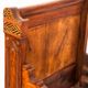 Bed made of solid walnut with marquetry details. France, 1930s.