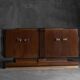 Art Deco walnut sideboard with brass details and sculptural base, France, 1930s