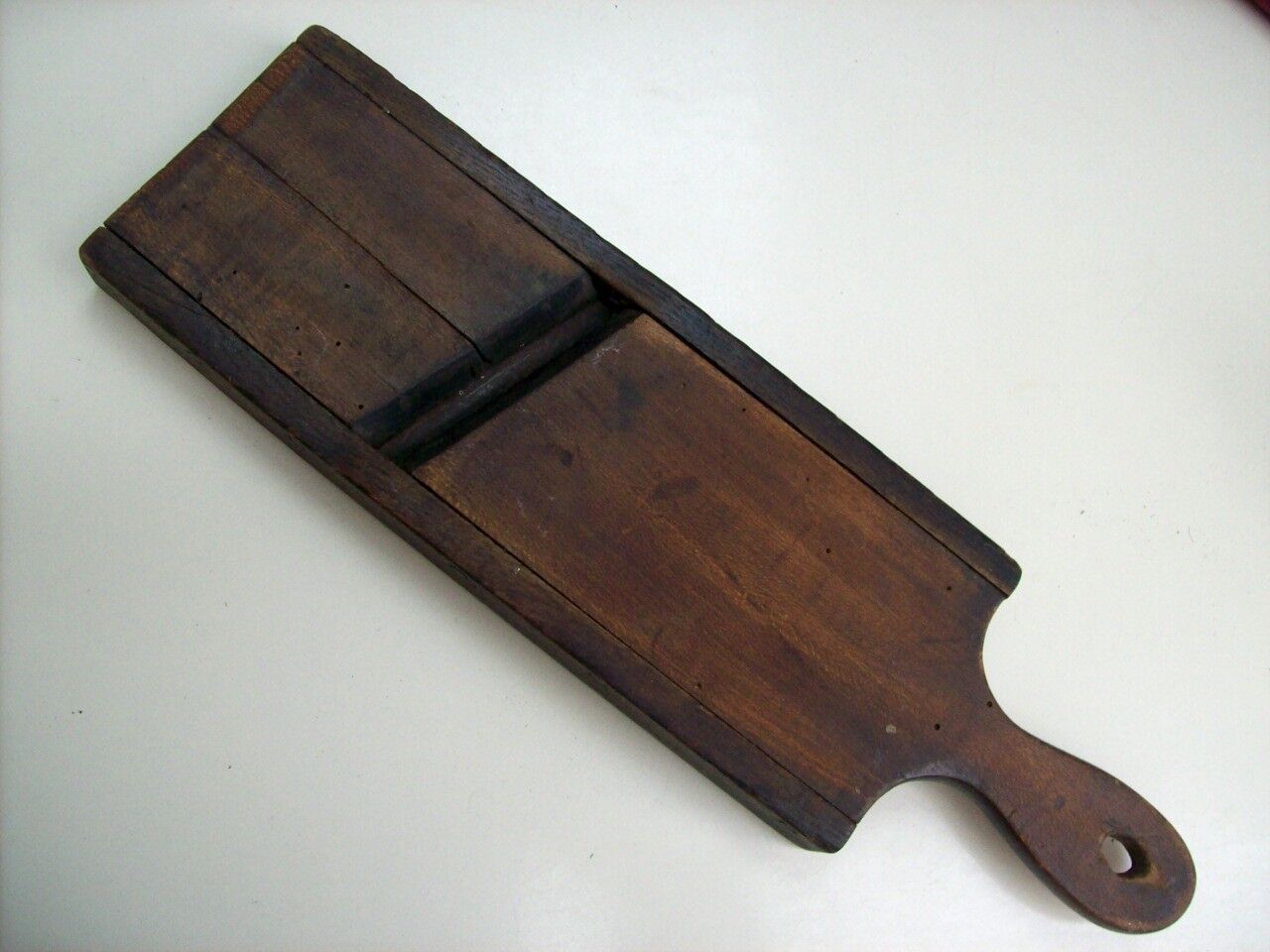 Old kitchen mandolin in wood and iron double blades