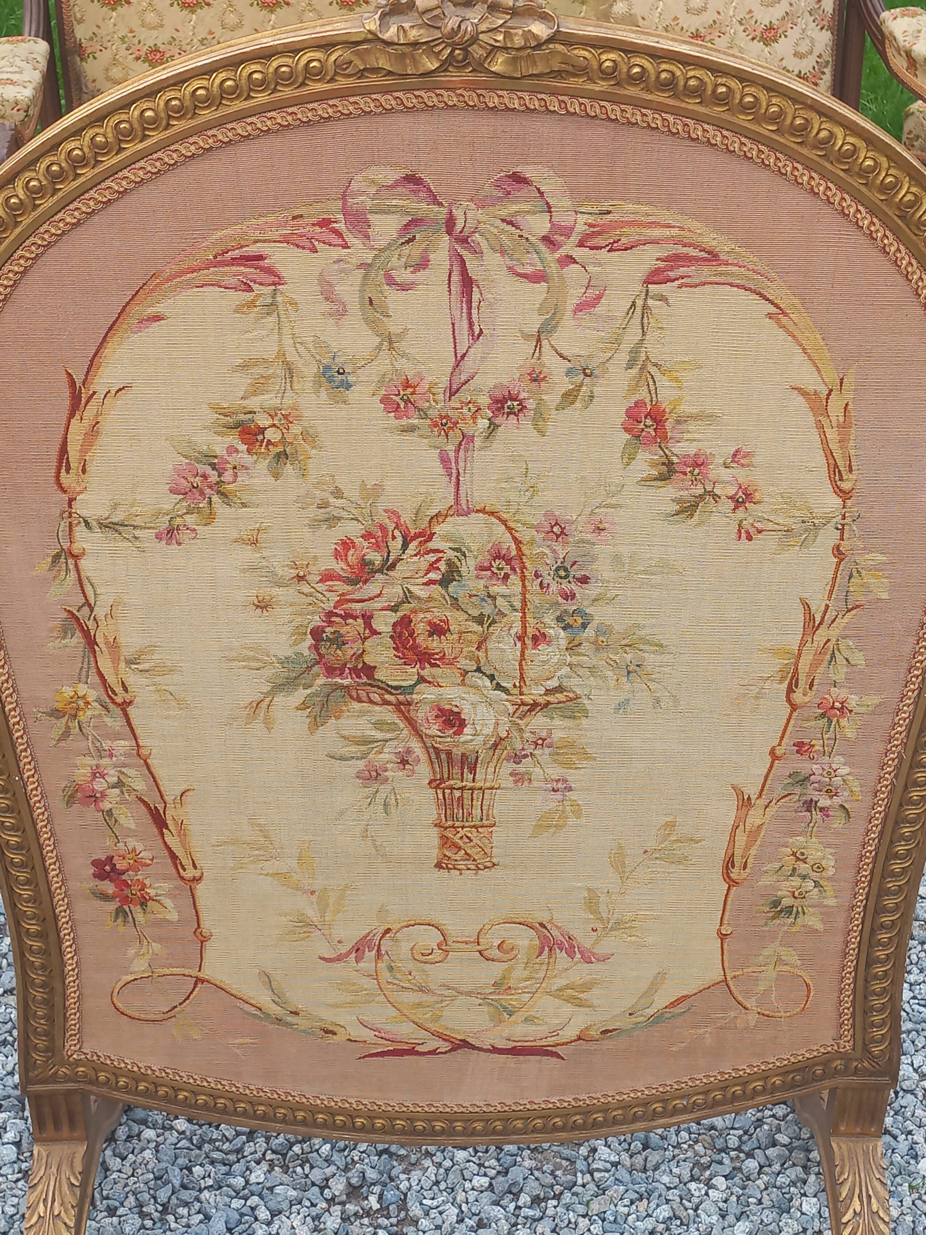 Golden wooden fireplace screen and Aubusson tapestry, 19th century.
