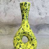 Yellow ceramic vase with green highlights