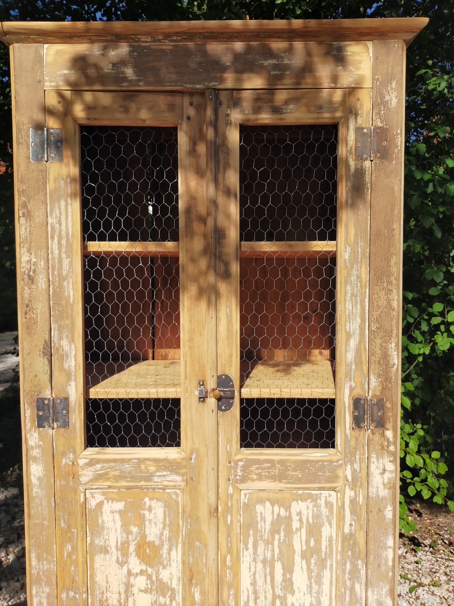 Renovated antique wooden wardrobe