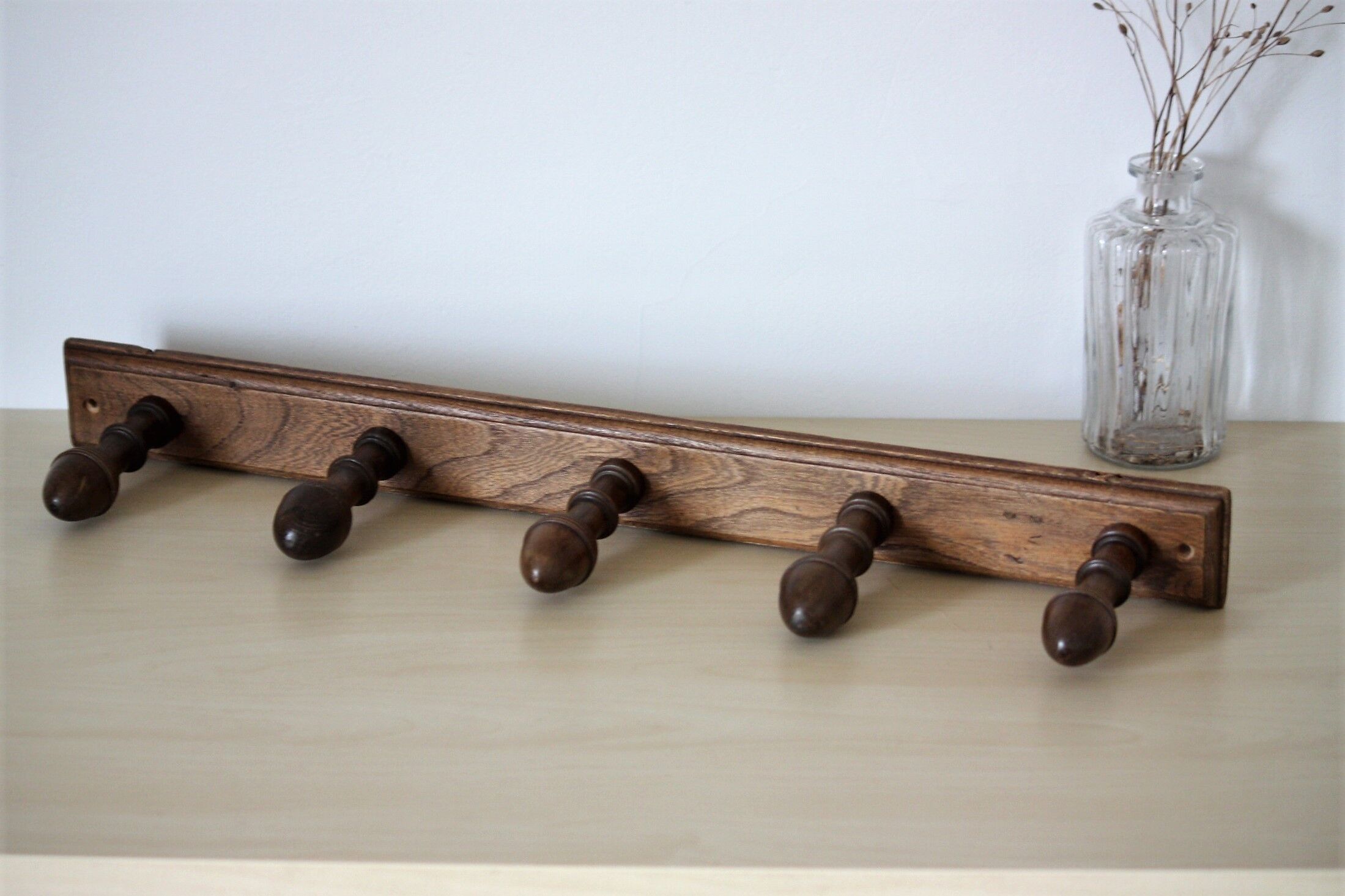 Turned wooden coat holder