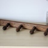 Turned wooden coat holder