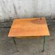 Vintage school desk made of wood and green metal - inkwell hole - antique.